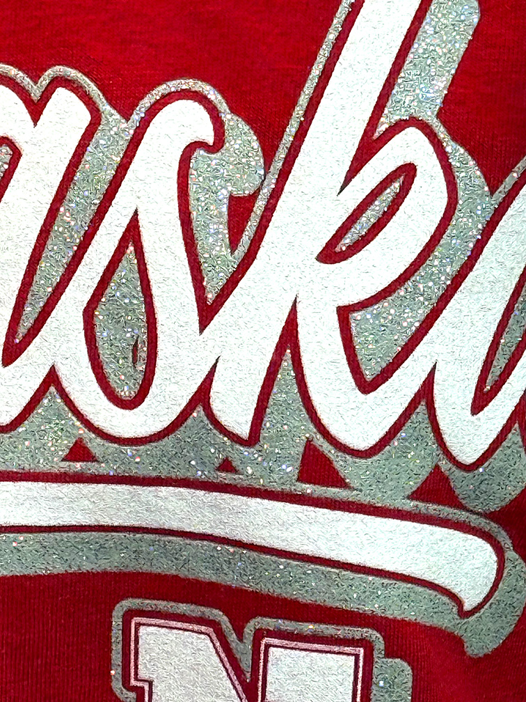 Womens Red Glitter Nebraska Script SS Harlow Tee Pressbox